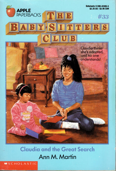 The Baby-Sitters Club #33: Claudia and the Great Search by Ann M. Martin Claudia and Emily Michelle are sitting on the floor surrounded by colored pieces of paper.